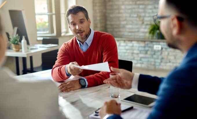 male-candidate-giving-his-cv-member-human-resource-team-while-having-job-interview-office male-candidate-giving-his-cv-member-human-resource-team-while-having-job-interview-office